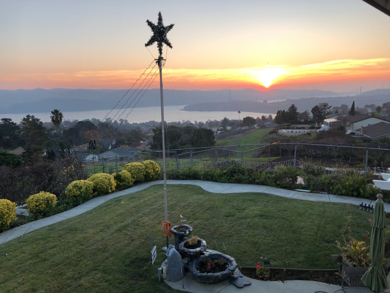 The sunset view from Benicia Angel's Home on Mills Drive
